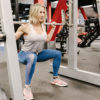 a women doing squats at the gym gyn workout prgram for women